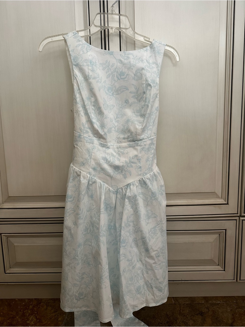 Sleeveless White Floral Midi Dress with Pale Blue Print